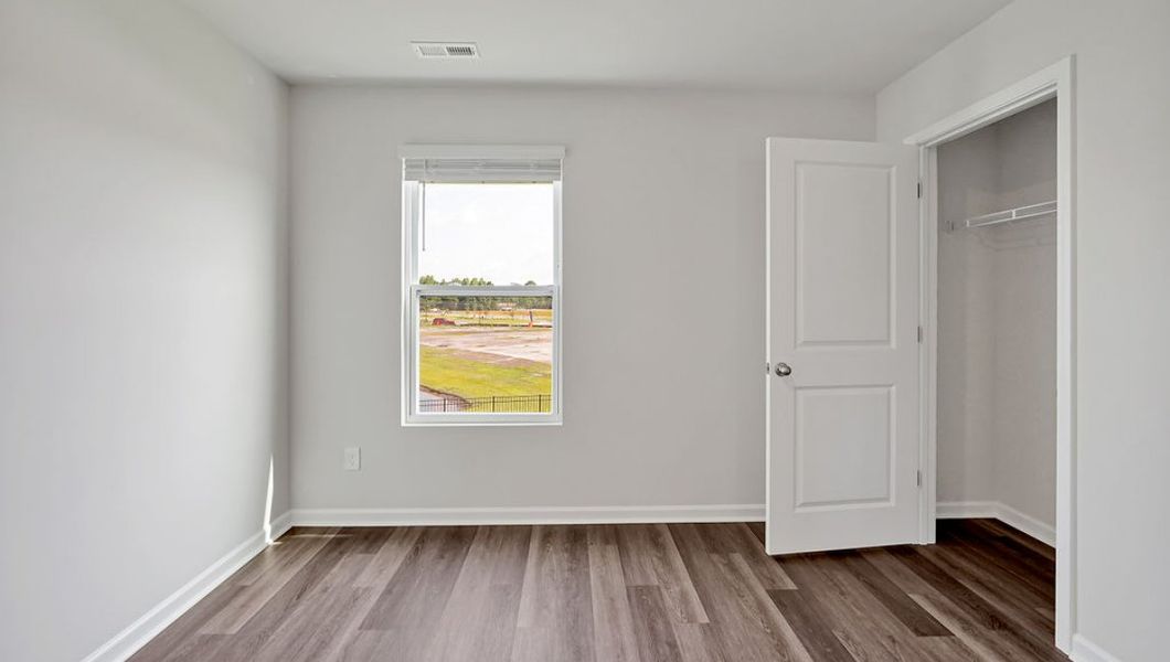 Representative unfurnished interior of a home built from the Hayden by D.R. Horton in Cedar Hill Landing, Navassa (Image 28).
