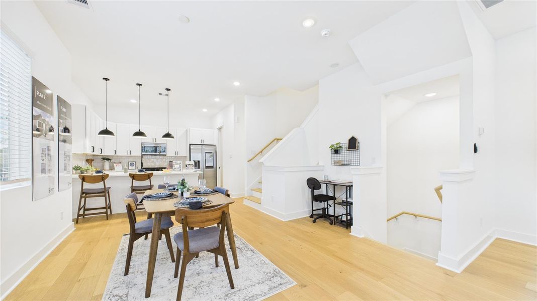 With seamless transitions between the living, dining, and kitchen areas, this space fosters effortless entertaining and everyday comfort. High ceilings, elegant finishes, and a spacious feel make this area a true centerpiece of the home, perfect for gatherings or quiet relaxation. With seamless transitions between the living, dining, and kitchen areas, this space fosters effortless entertaining and everyday comfort. High ceilings, elegant finishes, and a spacious feel make this area a true centerpiece of the home, perfect for gatherings or quiet relaxation.