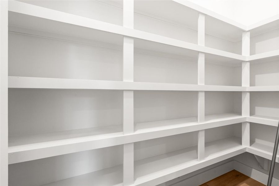 Bbuilt-in shelving gives you serious, dedicated storage that most homes simply don't offer. It's the kind of space that keeps the rest of the house clutter-free.