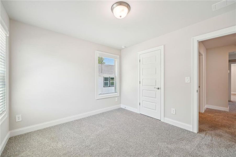 Spacious, unfurnished interior of a new home in Hemingway - Cottage Series, Cumming (Image 33). Spacious, unfurnished interior of a new home in Hemingway - Cottage Series, Cumming (Image 33).