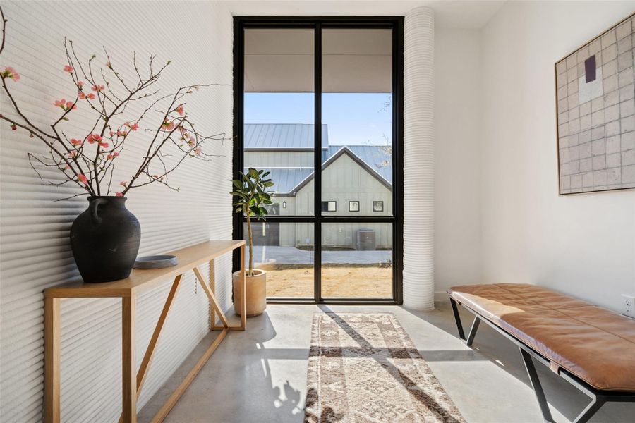 Entryway featuring concrete floors