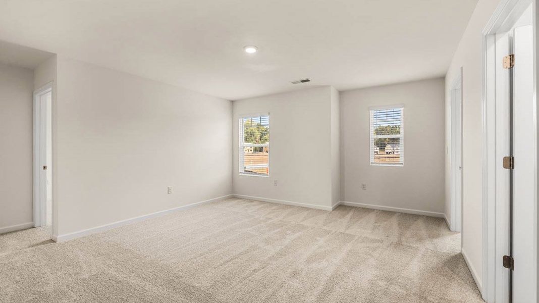 Representative unfurnished interior of a home built from the Dennis by D.R. Horton in Glenmaye, Hampton (Image 25).