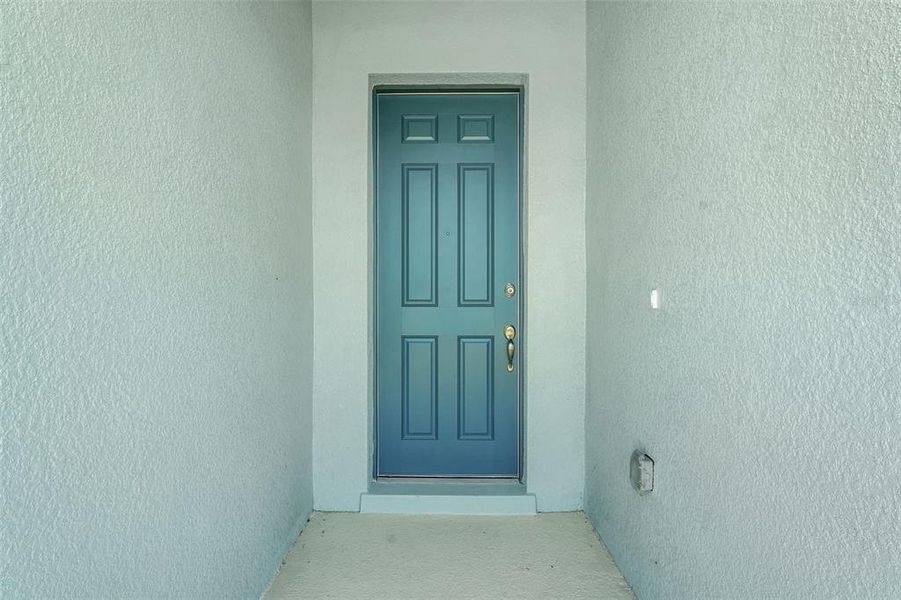 Exterior details and patio area of a home in Willowbrook North, Winter Haven (Image 23).