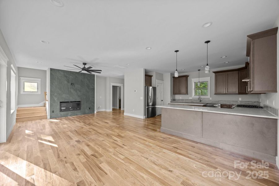 Tile accent wall with gas fireplace Tile accent wall with gas fireplace