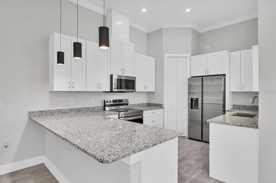 Furnished interior view inside a new home in , Port Charlotte (Image 11).