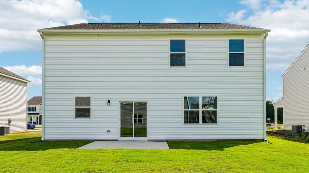 Exterior details and patio area of a home in The Reserve at Prestleigh, Wake Forest (Image 3).
