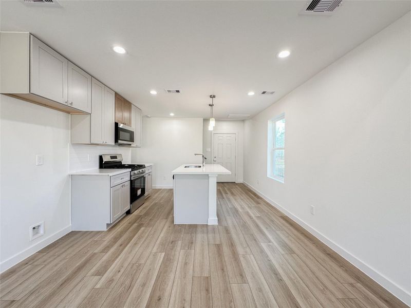 Furnished interior view inside a new home in , Conroe (Image 11).