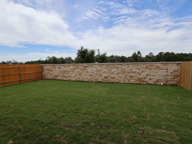 Exterior details and patio area of a home in Cedar Brook, Leander (Image 2). Exterior details and patio area of a home in Cedar Brook, Leander (Image 2).