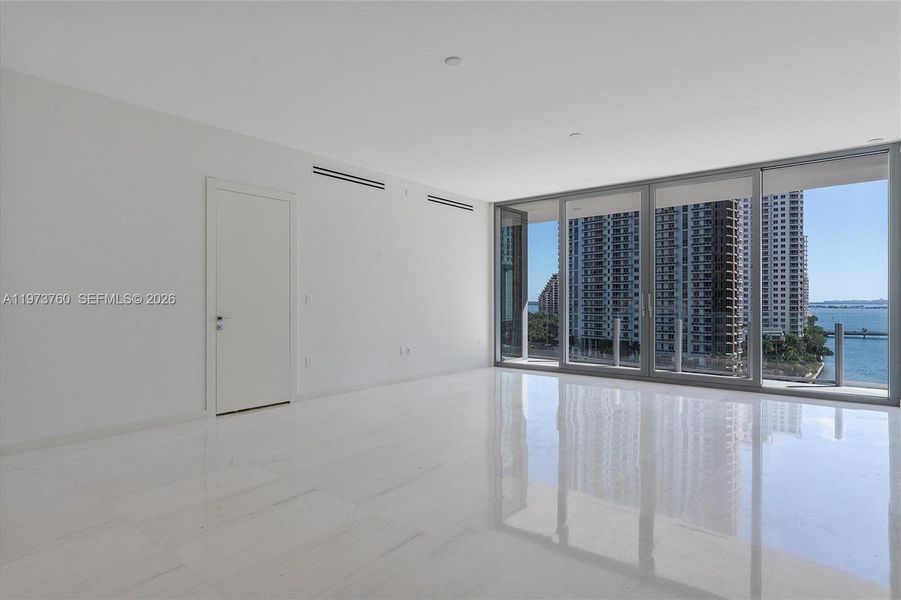 Spacious, unfurnished interior of a new home in Aston Martin Residences, Miami (Image 46).