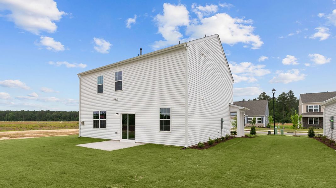 Exterior details and patio area of a home in West New Bern, New Bern (Image 4).