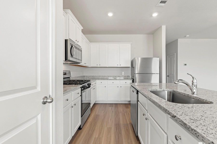 Furnished interior view inside a new home in Emberly, Beasley (Image 4).