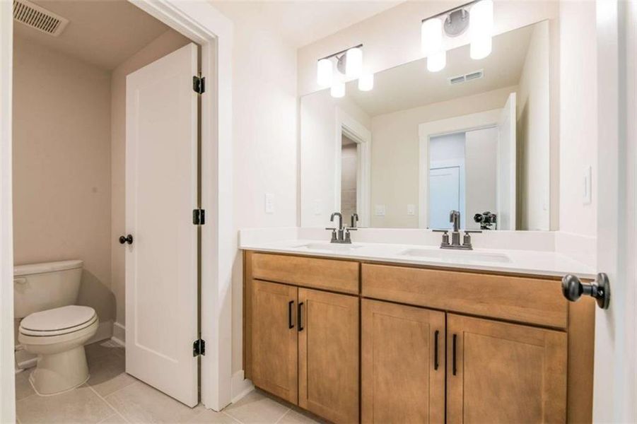 Furnished interior view inside a new home in The Paddocks at Doc Hughes, Buford (Image 32).