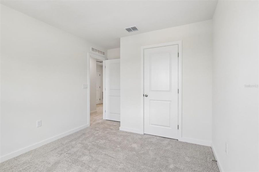 Spacious, unfurnished interior of a new home in Cyrene at Harmony, St. Cloud (Image 11). Spacious, unfurnished interior of a new home in Cyrene at Harmony, St. Cloud (Image 11).