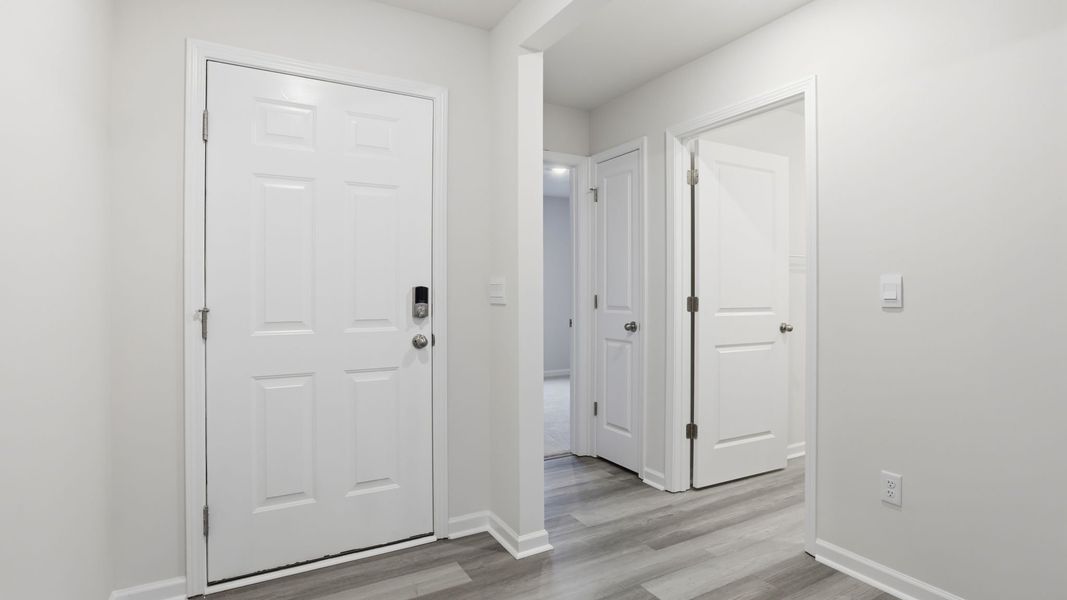 Spacious, unfurnished interior of a new home in Bentley Park, Greenwood (Image 15).