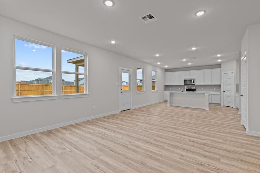 A kitchen with white cabinets. A kitchen with white cabinets.