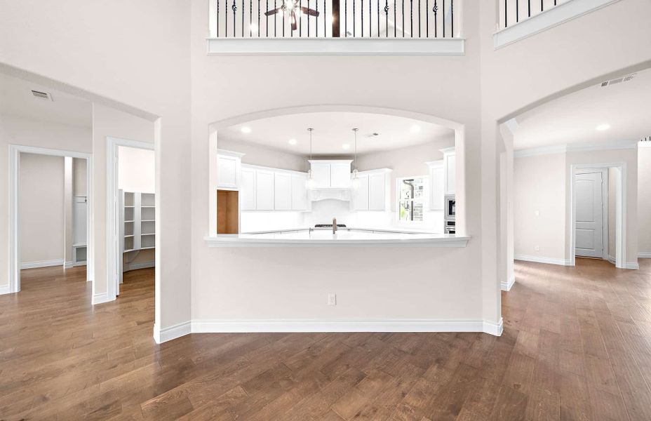 Representative furnished interior of a home built from the 4094 by Ravenna Homes in Artavia 70′, Conroe (Image 15).