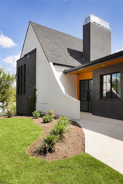 A beautiful display of a modern take on the classic Tudor style-this home wows upon entry.