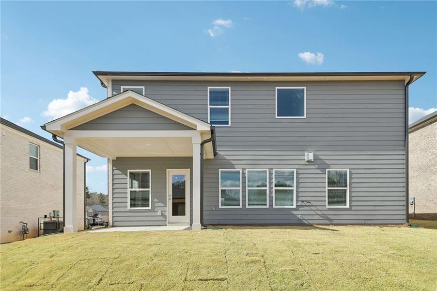 Exterior details and patio area of a home in Creekside at Oxford Park, Fairburn (Image 3).