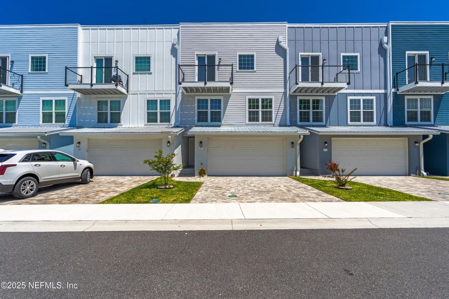 Front exterior of a new home in , St. Augustine, FL, highlighting curb appeal (Image 2).