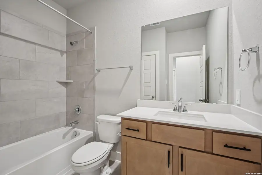 Furnished interior view inside a new home in Estancia Ranch - Premier Series, San Antonio (Image 12).