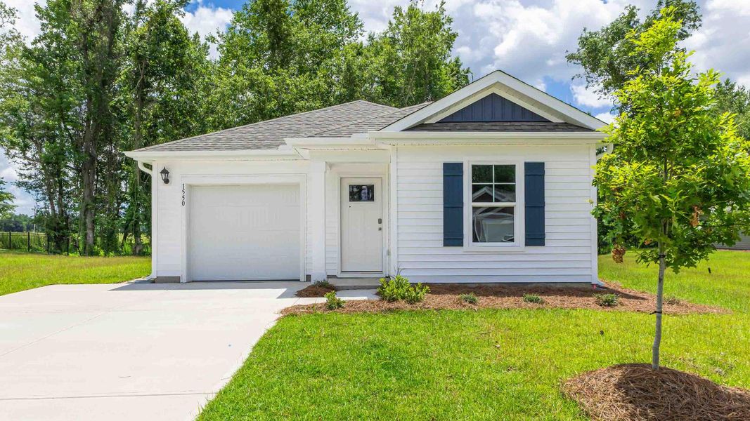 Front exterior of a new home in Eagle Creek, Bolivia, NC, highlighting curb appeal (Image 1). Front exterior of a new home in Eagle Creek, Bolivia, NC, highlighting curb appeal (Image 1).