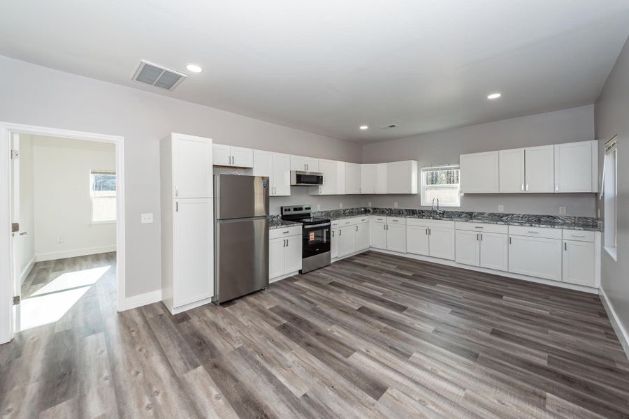Furnished interior view inside a new home in , Goose Creek (Image 7).