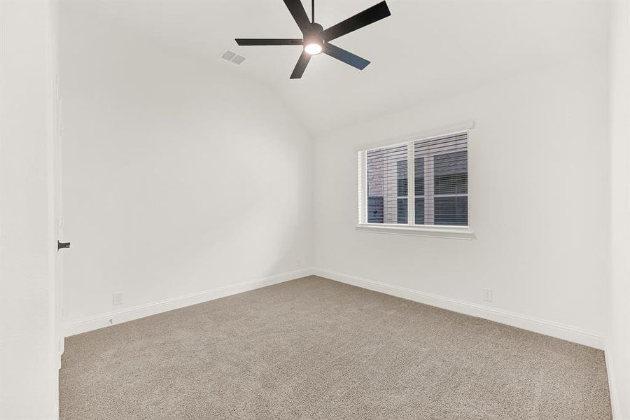 Bedroom 2 with closet and ceiling fan Bedroom 2 with closet and ceiling fan