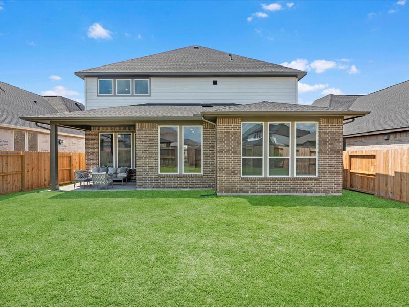 Front exterior of a new home in Jubilee 50′, Hockley, TX, highlighting curb appeal (Image 2).