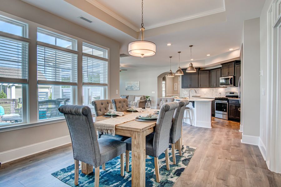 Representative furnished interior of a home built from the Portico by McKee Homes in The Cottages at 78 North, Sanford (Image 5).