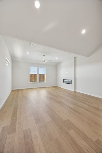 Living Room in the Wimbledon home plan by Trophy Signature Homes – REPRESENTATIVE PHOTO