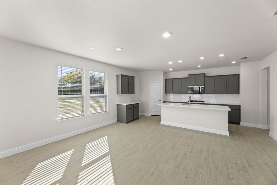 Representative exterior photo of a completed home built from the Lavon by Impression Homes in Timber Ridge, Corinth, TX (Image 12).