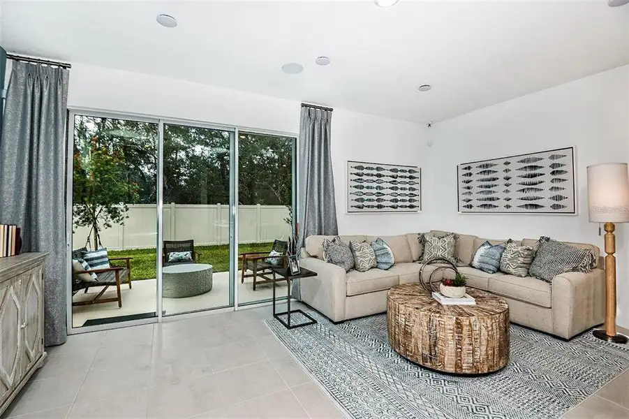 Furnished interior view inside a new home in The Townhomes at Anthem Park, St. Cloud (Image 4).