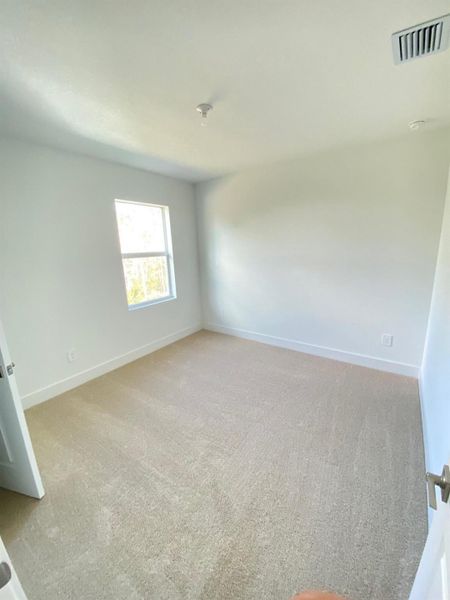 Spacious, unfurnished interior of a new home in Preserves at Park Trace, Stuart (Image 10).