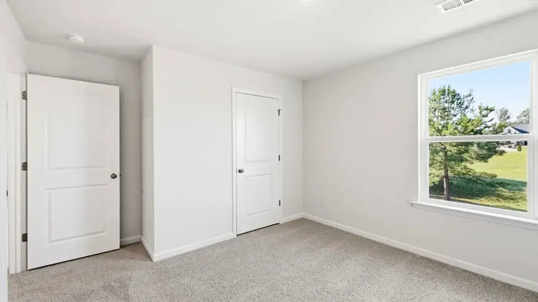 Spacious, unfurnished interior of a new home in Ben Hurt Road, Lyman (Image 31).