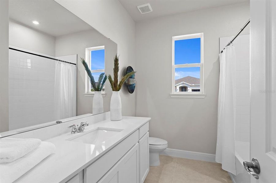 Furnished interior view inside a new home in Windwater, Parrish (Image 29).