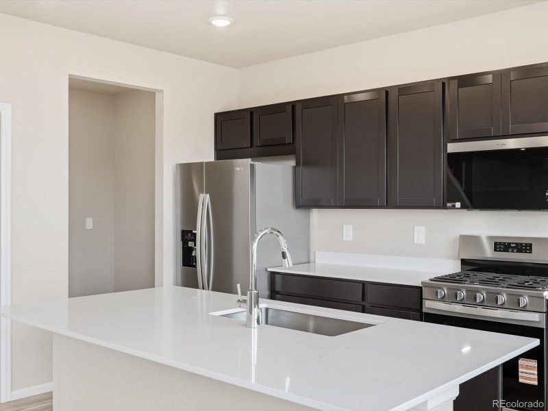 Furnished interior view inside a new home in , Commerce City (Image 7).