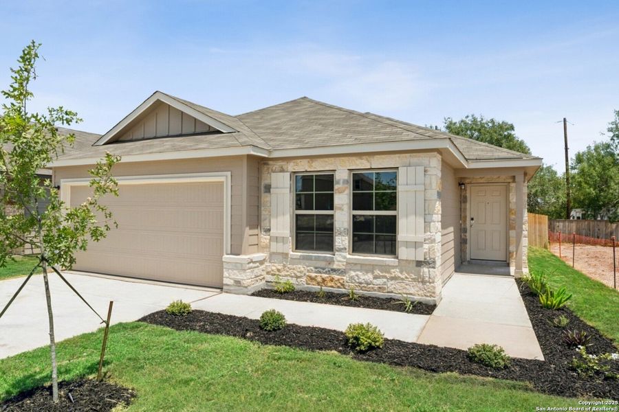 Front exterior of a new home in Cinco Lakes, San Antonio, TX, highlighting curb appeal (Image 1). Front exterior of a new home in Cinco Lakes, San Antonio, TX, highlighting curb appeal (Image 1).