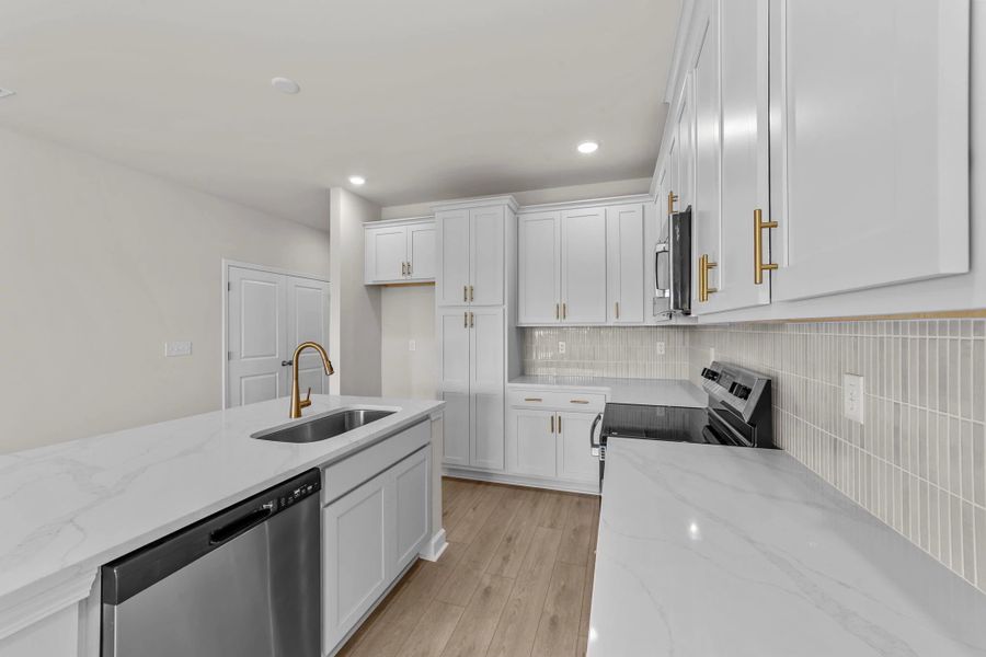 Furnished interior view inside a new home in Blue Heron Retreat, Little River (Image 9).