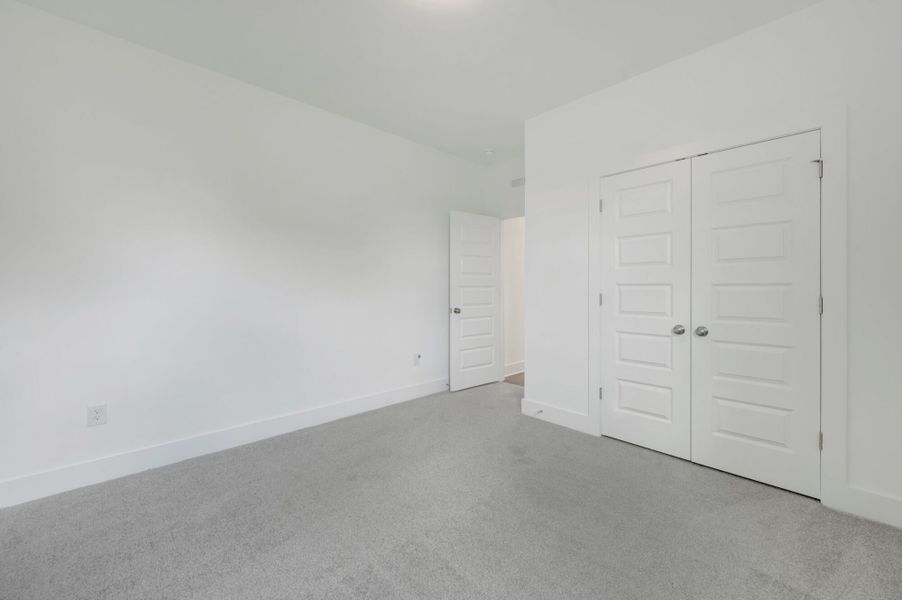 Spacious, unfurnished interior of a new home in McAlister Creek, Clayton (Image 25).