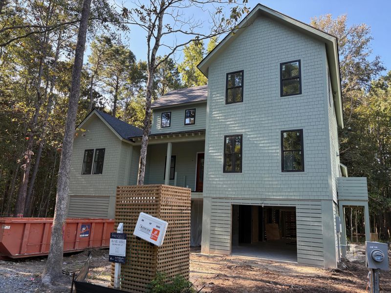 Front exterior of a new home in , Johns Island, SC, highlighting curb appeal (Image 1). Front exterior of a new home in , Johns Island, SC, highlighting curb appeal (Image 1).