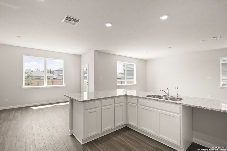 Furnished interior view inside a new home in Abbott Place, St. Hedwig (Image 7).