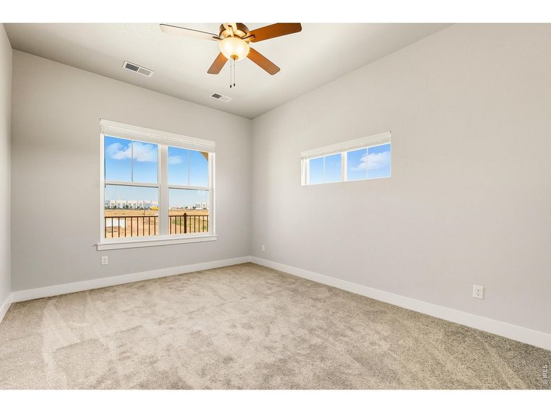 Spacious, unfurnished interior of a new home in The Lakes at Centerra, Loveland (Image 16).