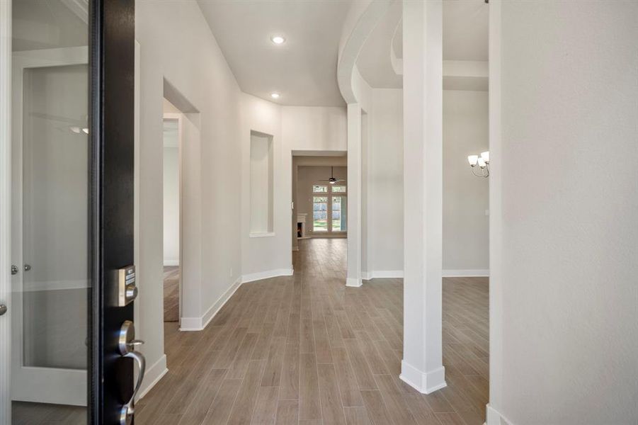 This inviting threshold sets the tone for the elevated interior that awaits inside, perfectly framing your new beginning in this beautiful home.