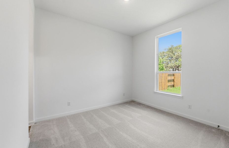 Spacious, unfurnished interior of a new home in 6 Creeks, Kyle (Image 37).