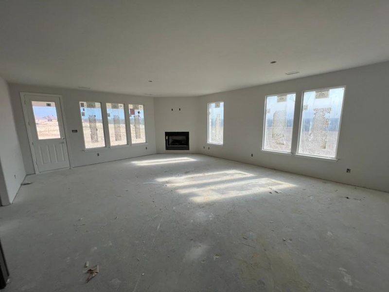 Unfurnished living room with a fireplace