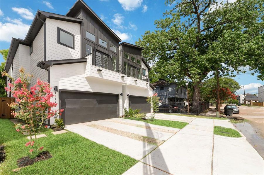 Side View of This First Floor Living Home Complemented by well-maintained Landscaping and Vibrant Trees Side View of This First Floor Living Home Complemented by well-maintained Landscaping and Vibrant Trees