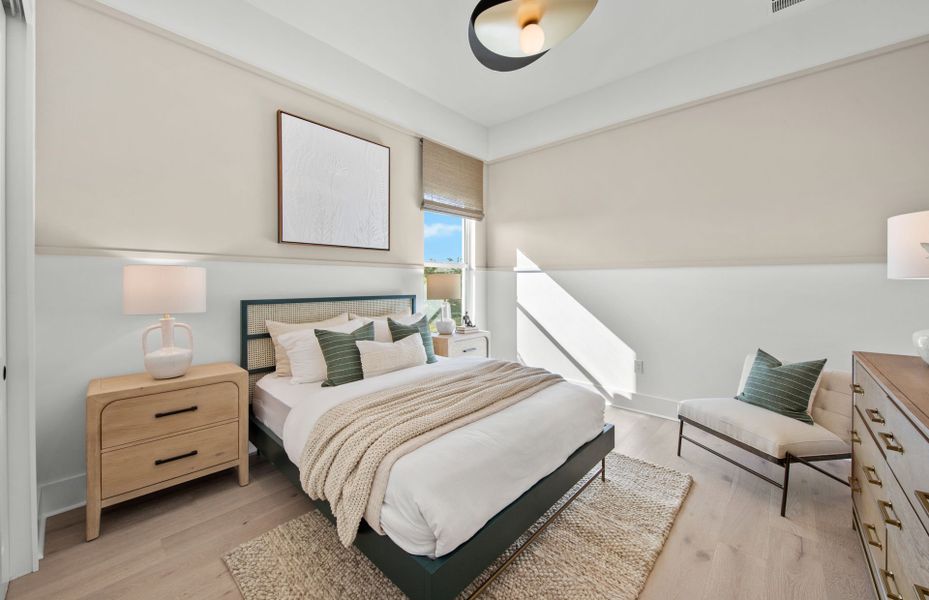 Representative furnished interior of a home built from the Layton Grande by DiVosta in BeachWalk by Manasota Key, Englewood (Image 16).