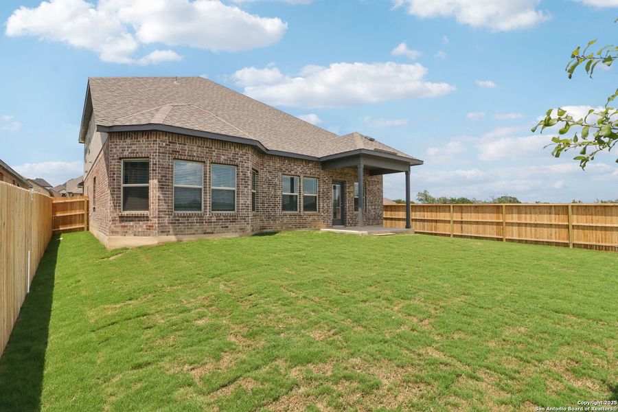 Front exterior of a new home in Arcadia Ridge - Classic Series, San Antonio, TX, highlighting curb appeal (Image 23).