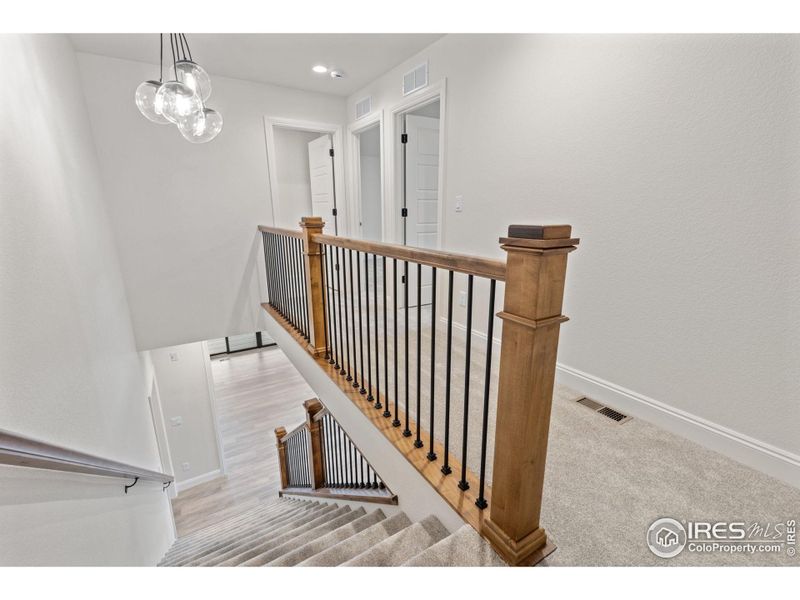 Upstairs leading to the second and third bedrooms