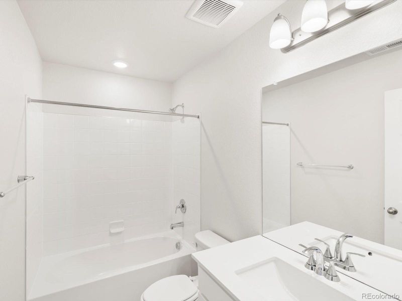 Furnished interior view inside a new home in Buffalo Highlands: The Flora Collection, Commerce City (Image 11).